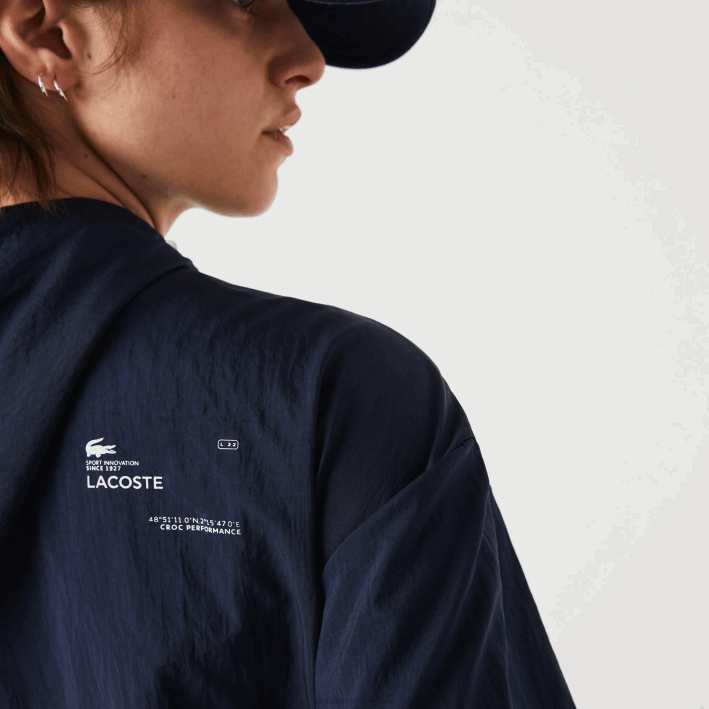 mujer Lacoste 6F242633 azul marino verde bwy chamarra deportiva ligera de nailon y malla con cremallera