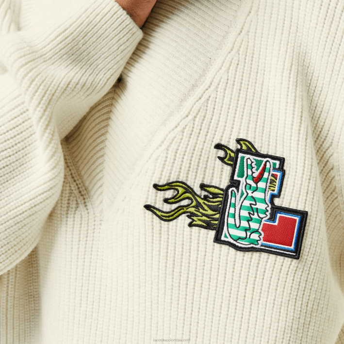 mujer Lacoste 6F242642 blanco 70v jersey de lana con cuello de pico y placa de cómic