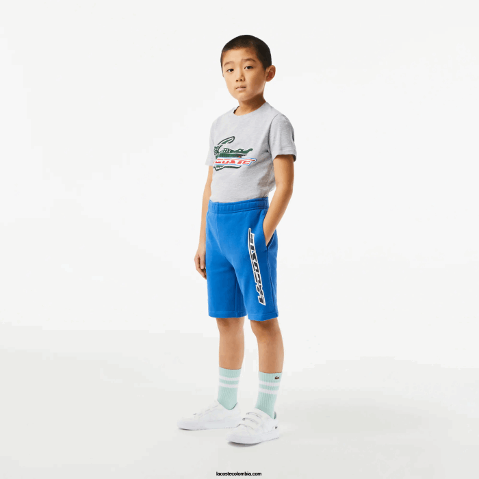 Niños Lacoste 6F243087 kxb azul shorts de algodón orgánico con logo en contraste Niños Lacoste 6F243087 kxb azul shorts de algodón orgánico con logo en contraste