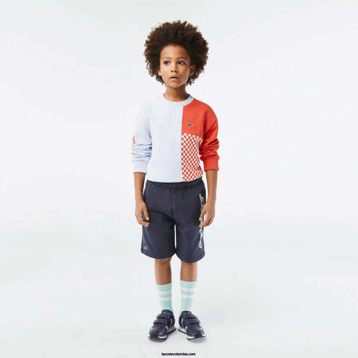 Niños Lacoste 6F243088 kxe azul shorts de algodón orgánico con logo en contraste Niños Lacoste 6F243088 kxe azul shorts de algodón orgánico con logo en contraste