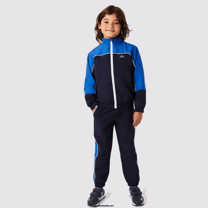 Niños Lacoste 6F243209 azul marino 976 chándal deportivo con diseño colour block Niños Lacoste 6F243209 azul marino 976 chándal deportivo con diseño colour block