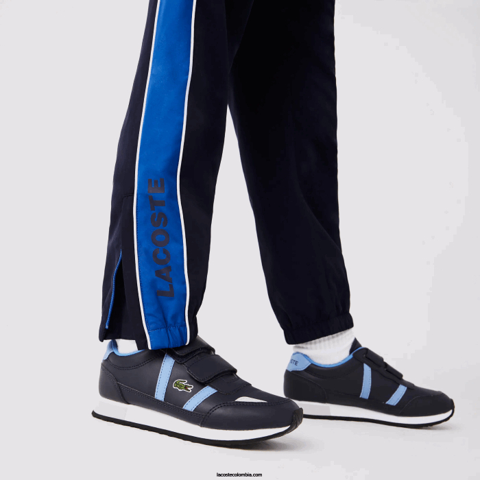 Niños Lacoste 6F243209 azul marino 976 chándal deportivo con diseño colour block