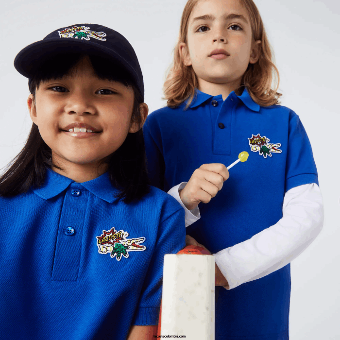 niños Lacoste 6F243145 k1q azul polo de piqué de algodón orgánico con insignia de cómic niños Lacoste 6F243145 k1q azul polo de piqué de algodón orgánico con insignia de cómic
