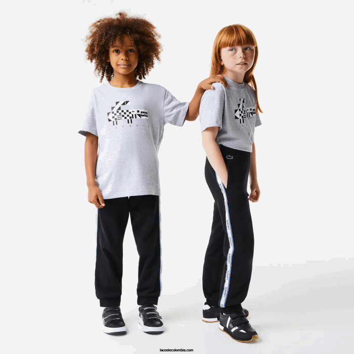 niños Lacoste 6F243223 negro azul 985 pantalones de chándal con bandas estampadas niños Lacoste 6F243223 negro azul 985 pantalones de chándal con bandas estampadas